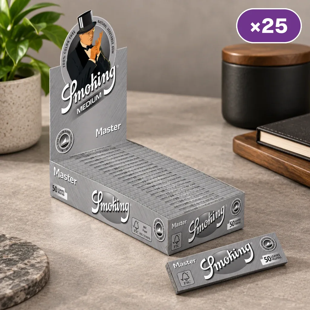 Expositor gris de papel de liar Smoking Master Medium con librillos alineados y uno delante, sobre una mesa con distintivo «×25».