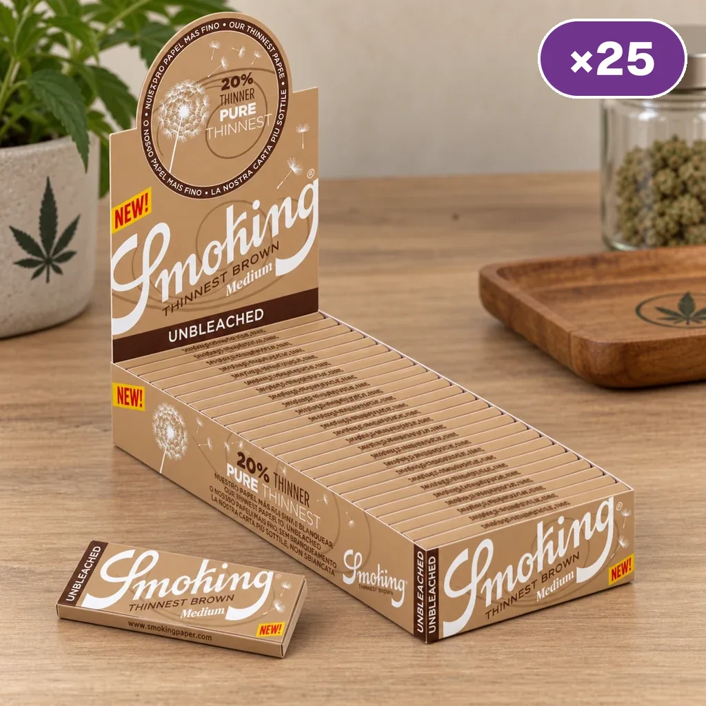 Expositor abierto de papel Smoking Thinnest Brown Medium con varios librillos marrones, uno delante y distintivo de 25 unidades.
