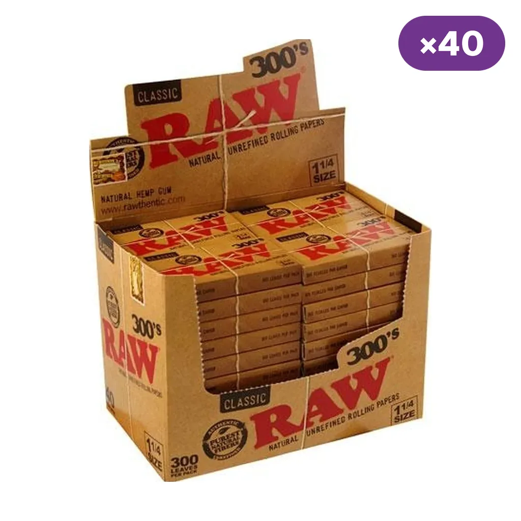 Caja expositora abierta de papel RAW Classic 1 1/4, con varios blocs marcados 300 y un distintivo de 40 unidades.