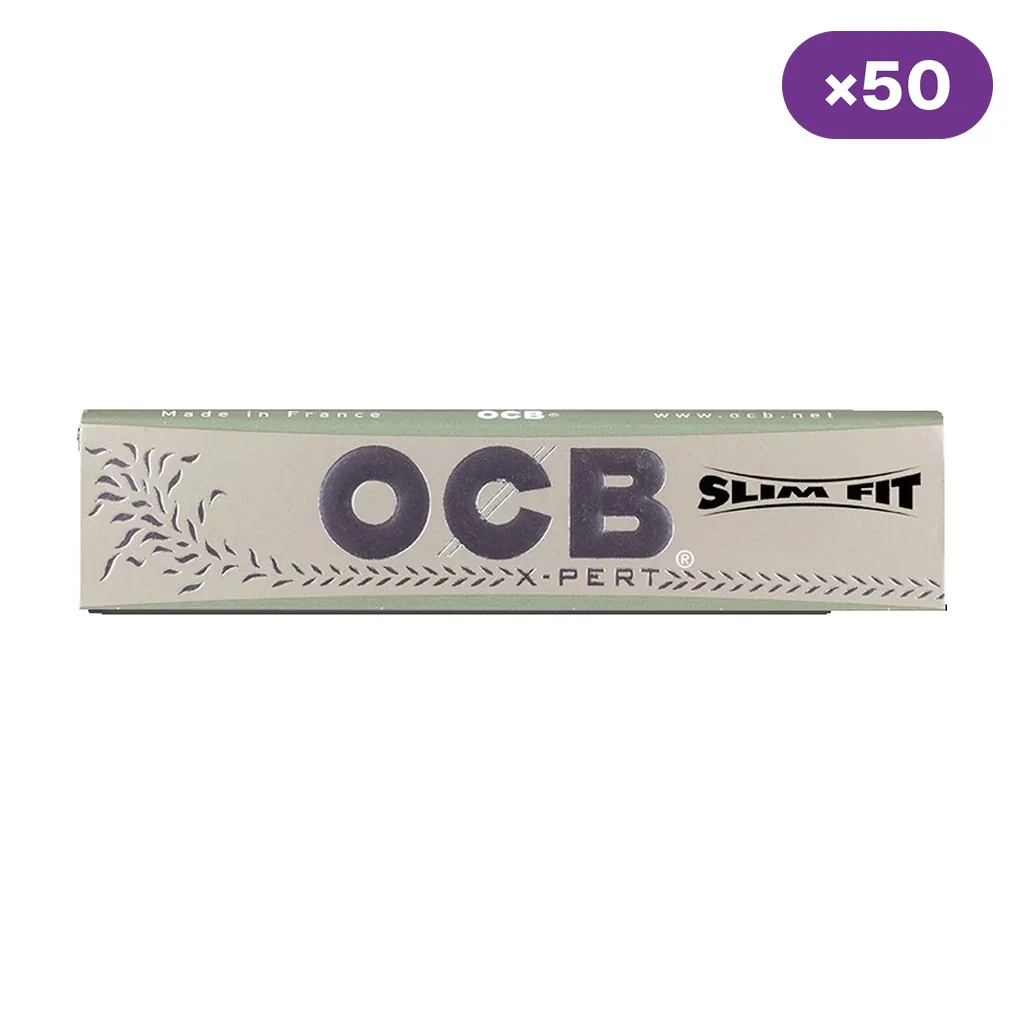 Librillo gris de papel OCB X-Pert Slim Fit sobre fondo blanco, con logotipo grande y distintivo morado que indica 50 unidades.