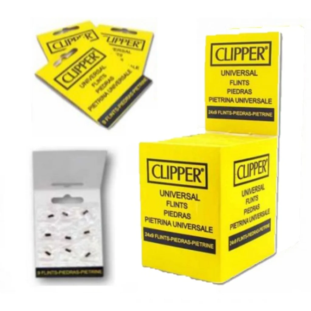 Expositor amarillo Clipper de piedras para encendedor, junto a sobres amarillos y un blíster abierto con pequeñas piedras oscuras.