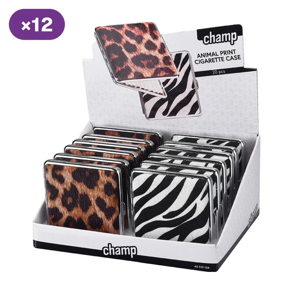 Expositor de pitilleras Champ con bordes plateados y dos estampados: manchas de leopardo y rayas de cebra en blanco y negro.