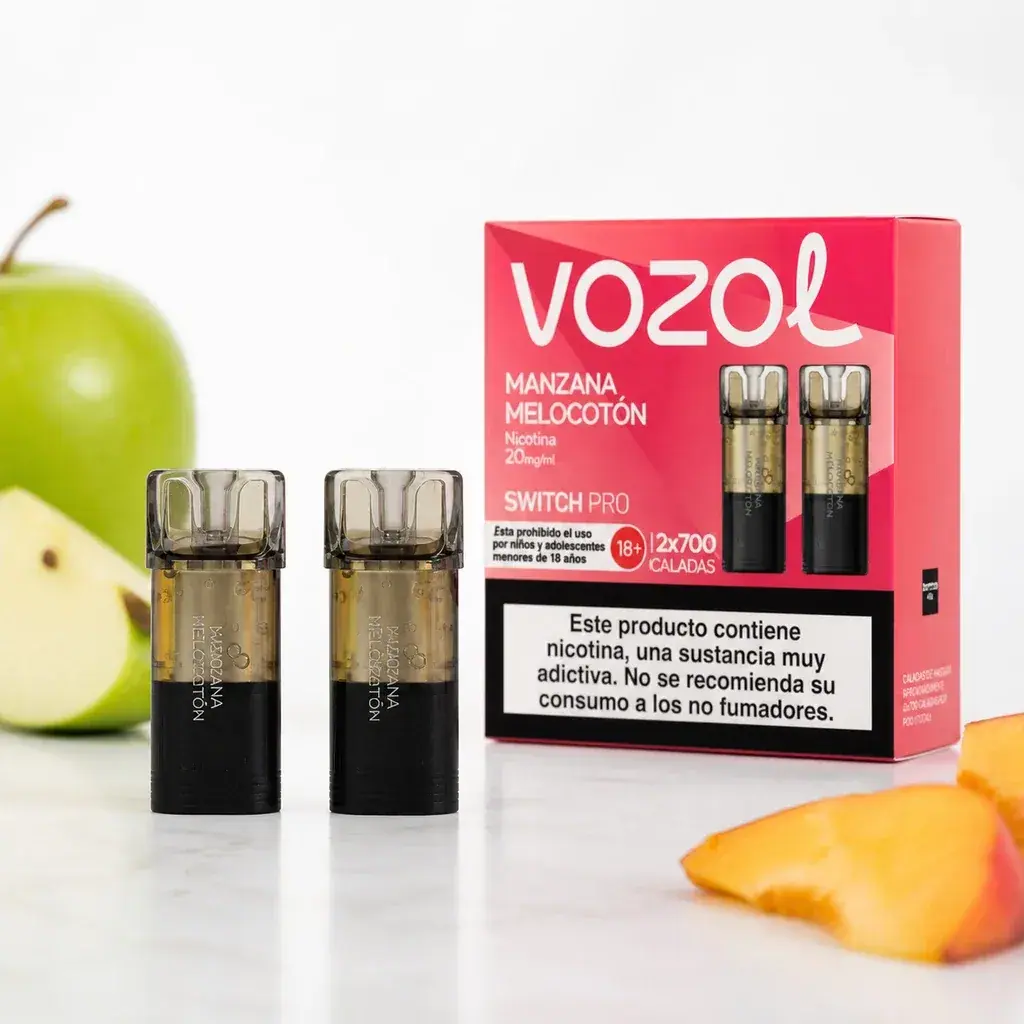 Recambios Vozol Switch Pro Apple Peach junto a su caja rosa con indicación de 20 mg/ml, una manzana verde y trozos de melocotón.
