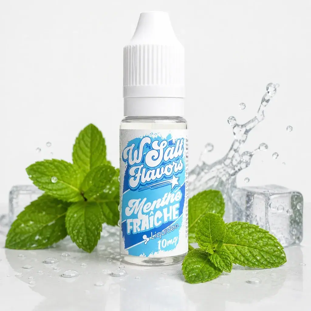 Frasco Liquideo de sales de nicotina Fresh Mint con tapón blanco y etiqueta azul, rodeado de hojas de menta, hielo y salpicaduras.