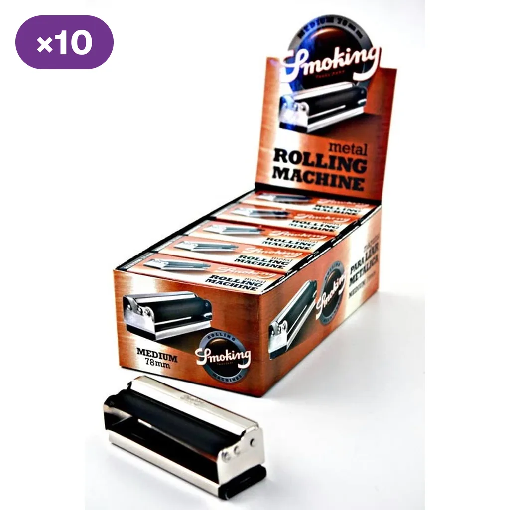 Máquina de liar metálica Smoking con rodillos negros en primer plano y expositor con varias cajas detrás, rotulado Medium 78 mm.