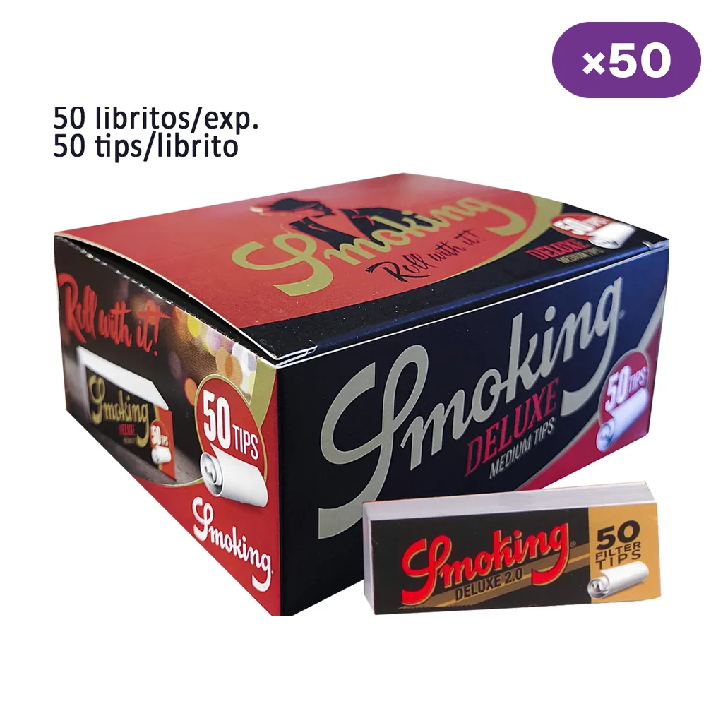 Caja expositora Smoking Deluxe y un librito de filtros delante, con texto que indica 50 libritos por expositor y 50 tips por librito. Caja expositora Smoking Deluxe y un librito de filtros delante, con texto que indica 50 libritos por expositor y 50 tips por librito.