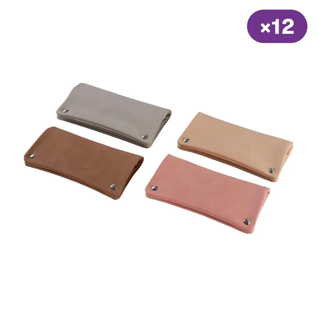 Selección de tabaqueras lisas cerradas en gris, marrón, beige y rosa, con botones metálicos en las esquinas, sobre fondo blanco.