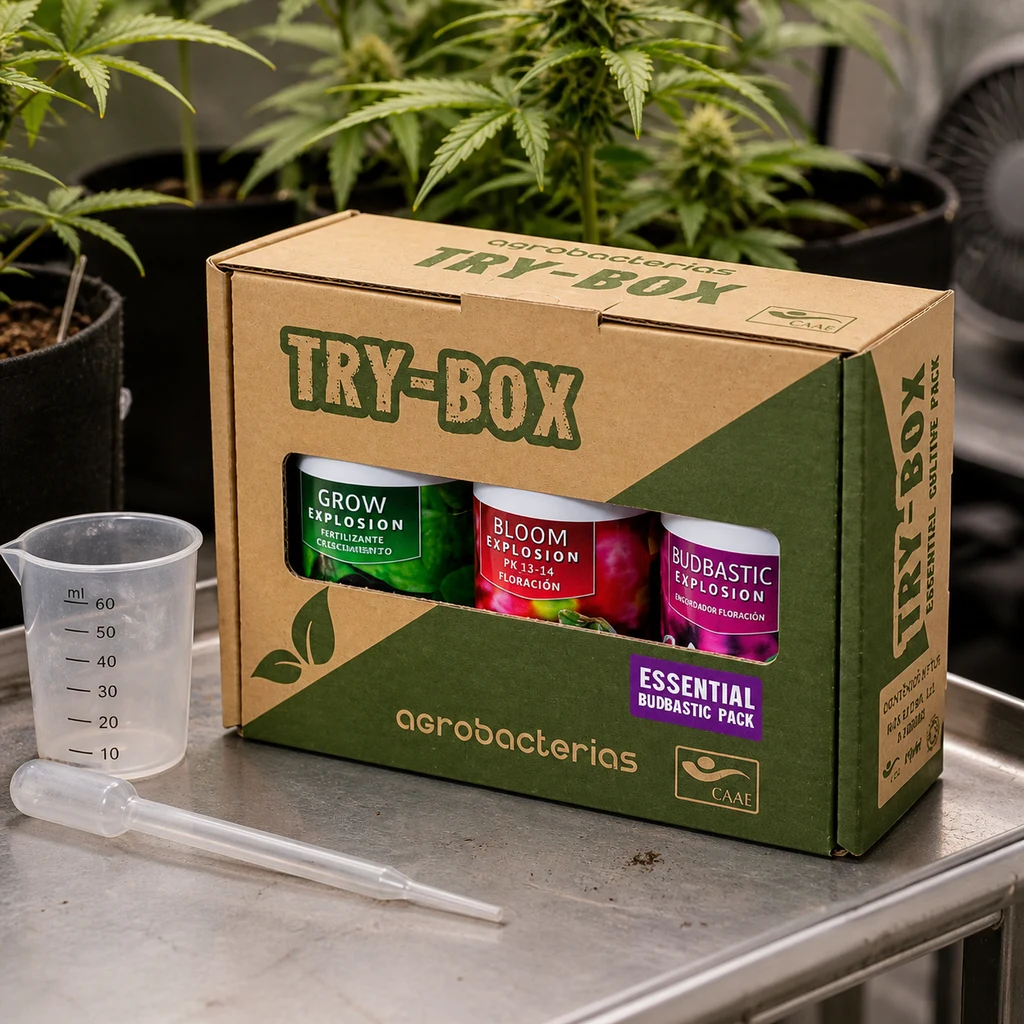 Caja Try-Box de Agrobacterias con tres botes visibles, junto a un vaso graduado y una pipeta, con plantas al fondo.