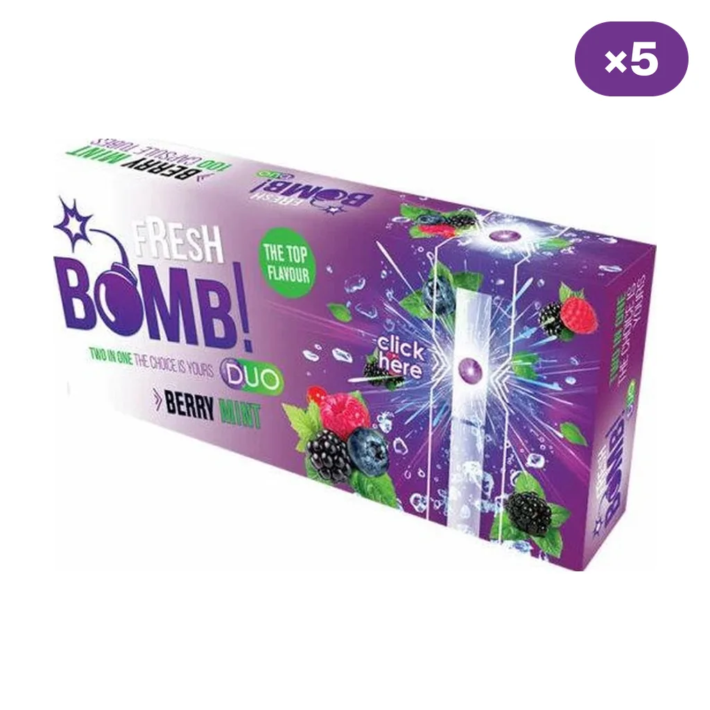 Caja morada Fresh Bomb Duo Berry Mint decorada con frutos rojos, hojas de menta y un tubo con cápsula morada junto al texto «click here».