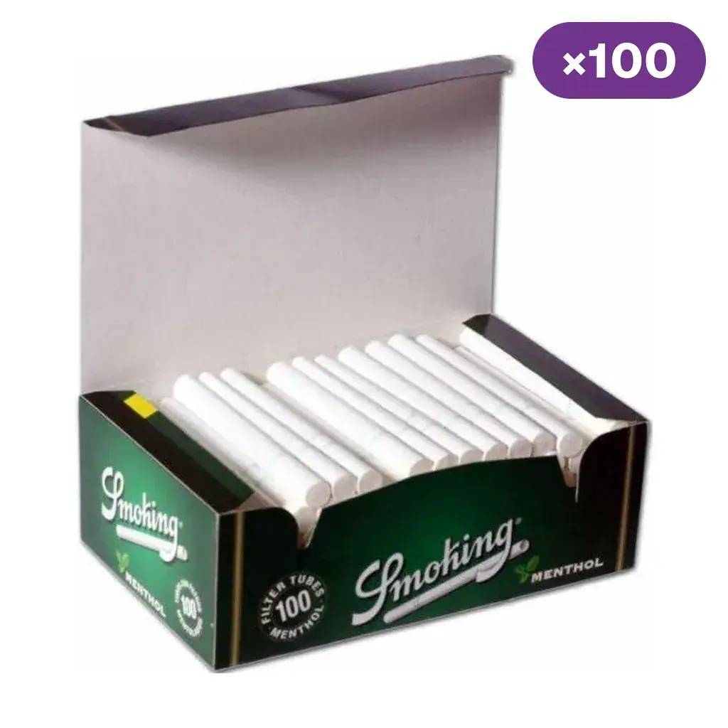 Caja verde abierta de tubos Smoking Menthol, con varias unidades blancas alineadas en su interior y la indicación de 100 unidades.