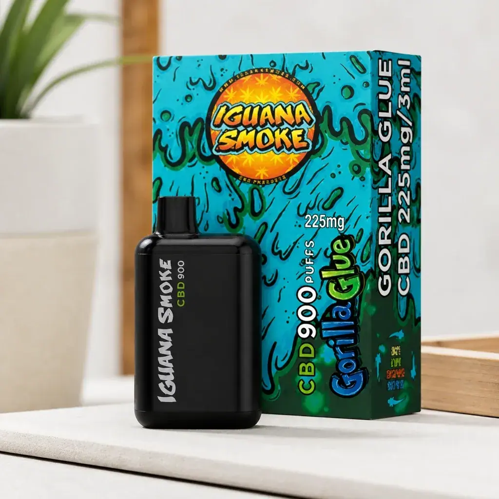 Vape negro Iguana Smoke CBD 900 delante de su caja turquesa Gorilla Glue, con las inscripciones 225 mg, 3 ml y 900 puffs.