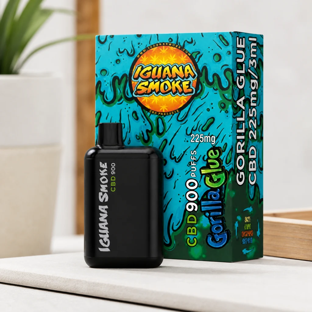 Vape negro Iguana Smoke CBD 900 delante de su caja turquesa Gorilla Glue, con las inscripciones 225 mg, 3 ml y 900 puffs.