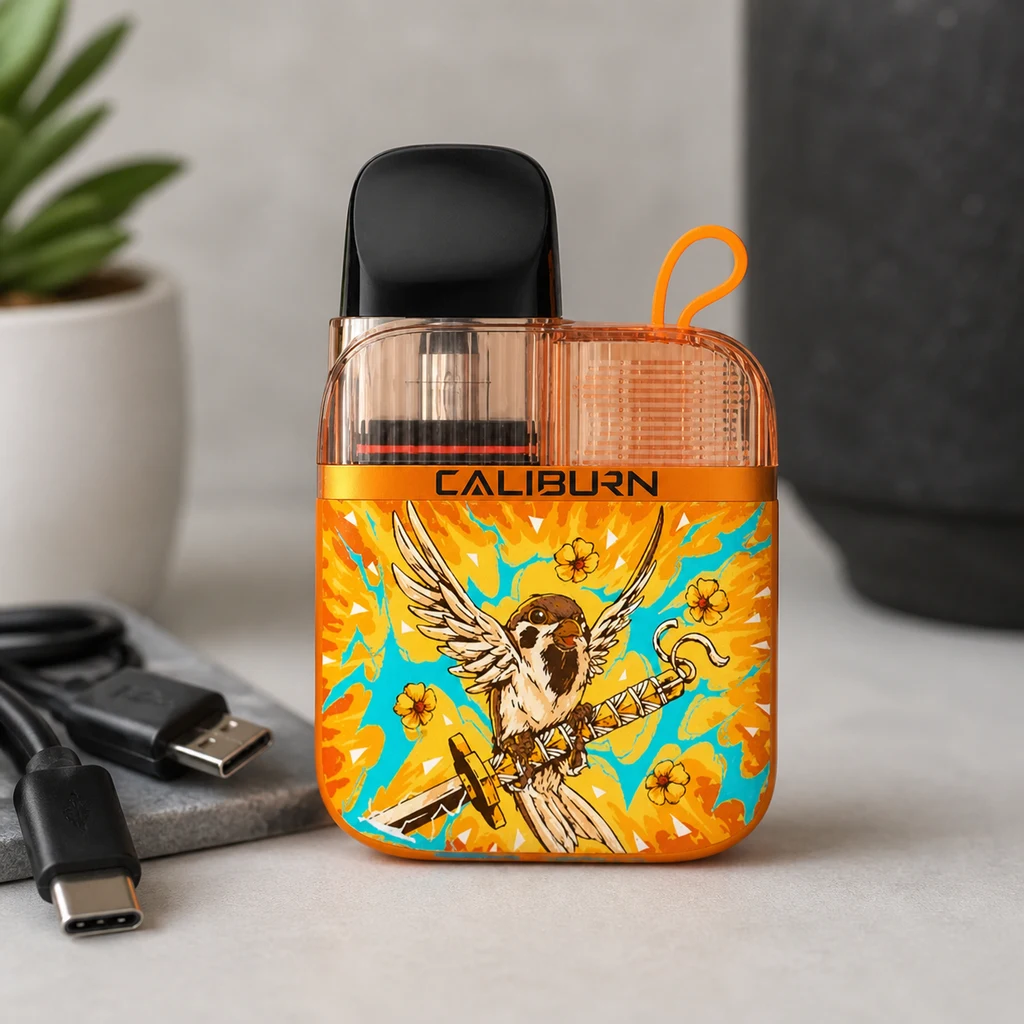 Vape Uwell Caliburn G3 Lite Thunder naranja con boquilla negra y un ave sobre una espada, junto a un cable USB.
