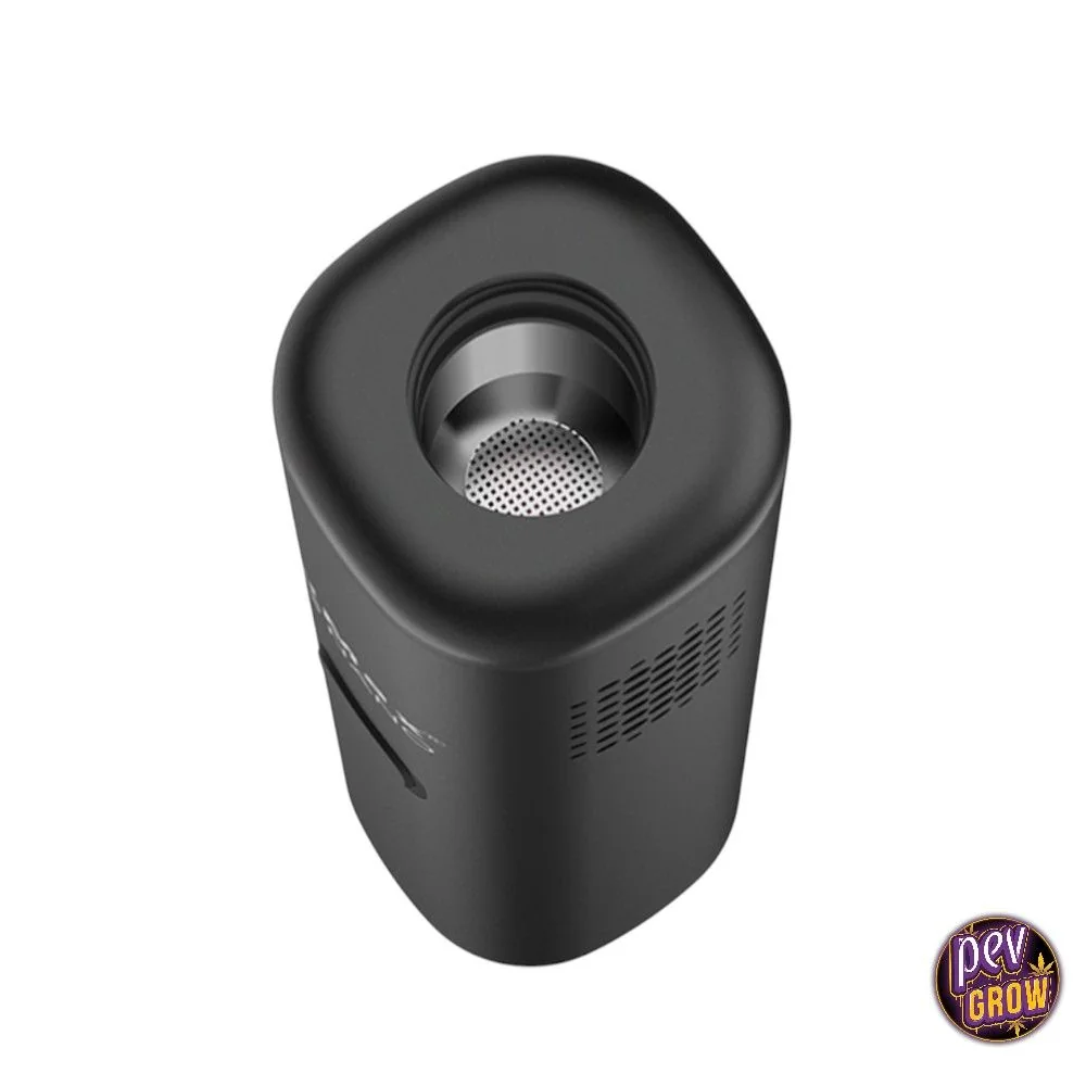 Vaporizador XVAPE XMAX V3 Nano negro visto desde arriba, con cámara abierta, rejilla circular interior y ranuras laterales.