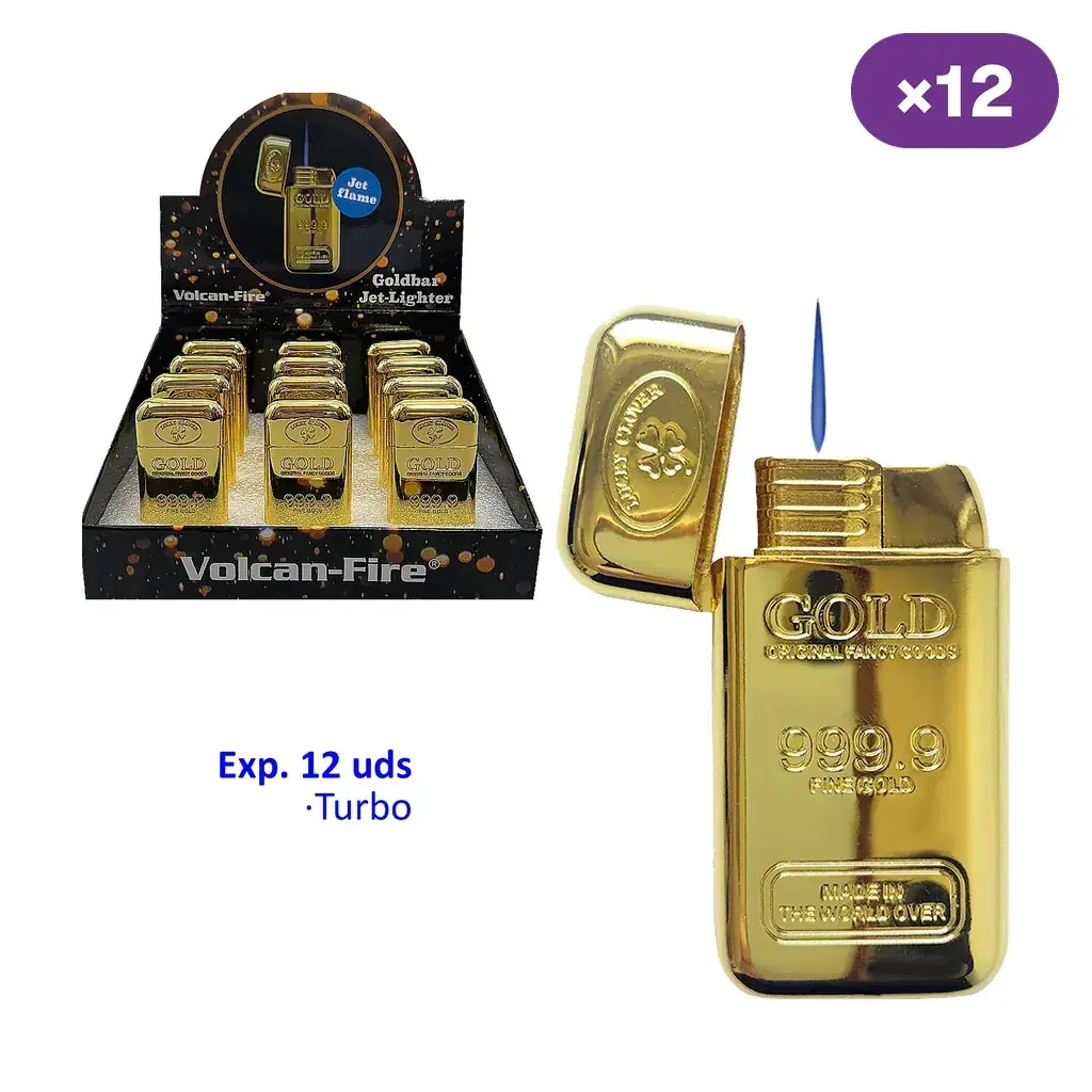Encendedor Volcan-Fire dorado con forma de lingote, abierto y con llama azul, junto a un expositor rotulado de 12 unidades.