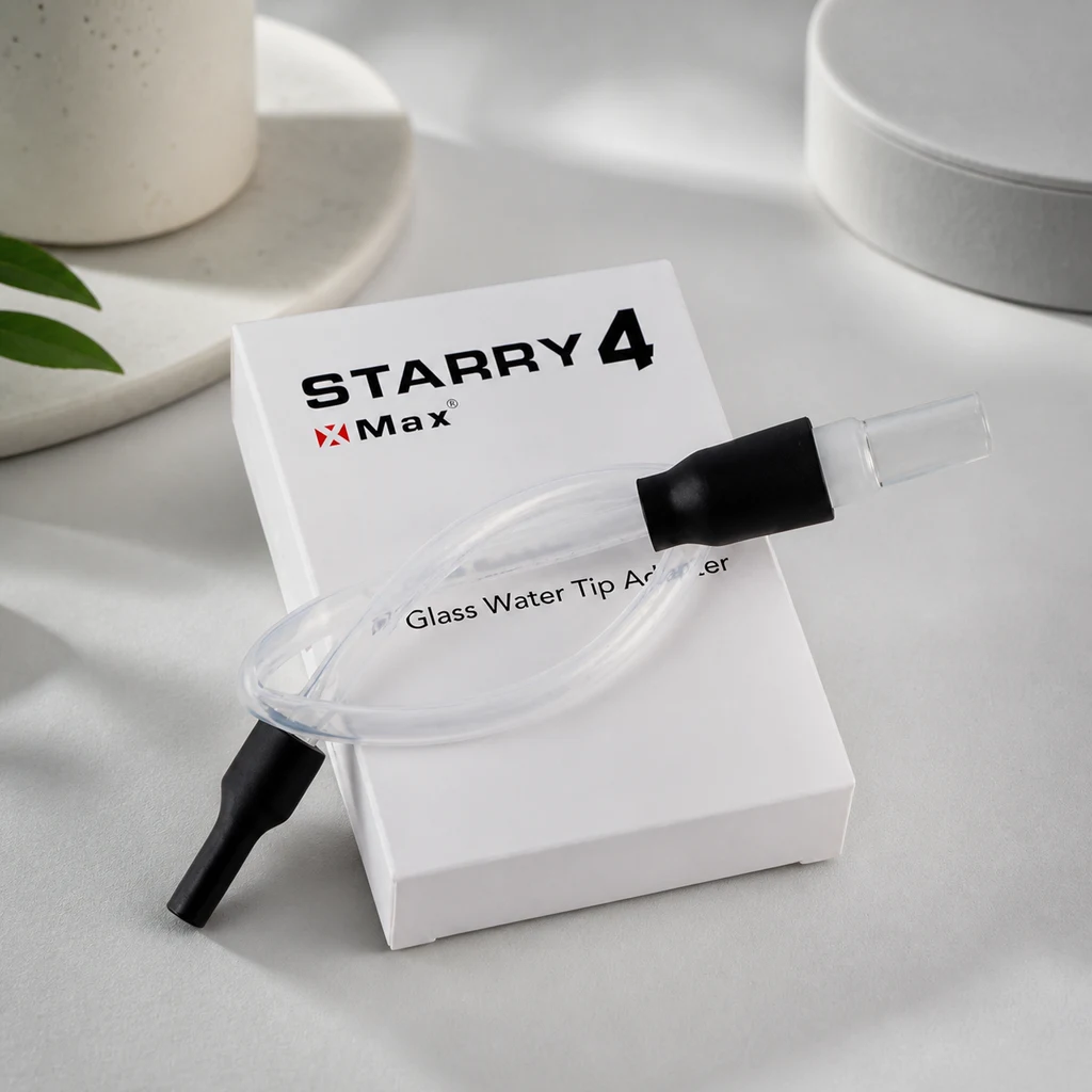 Accesorio de boquilla X-vape Starry V.4 con tubo transparente curvado y extremos negros, sobre una caja blanca rotulada STARRY 4.